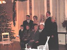 Stephanie and Devin with his parents, sisters family, and grandmother